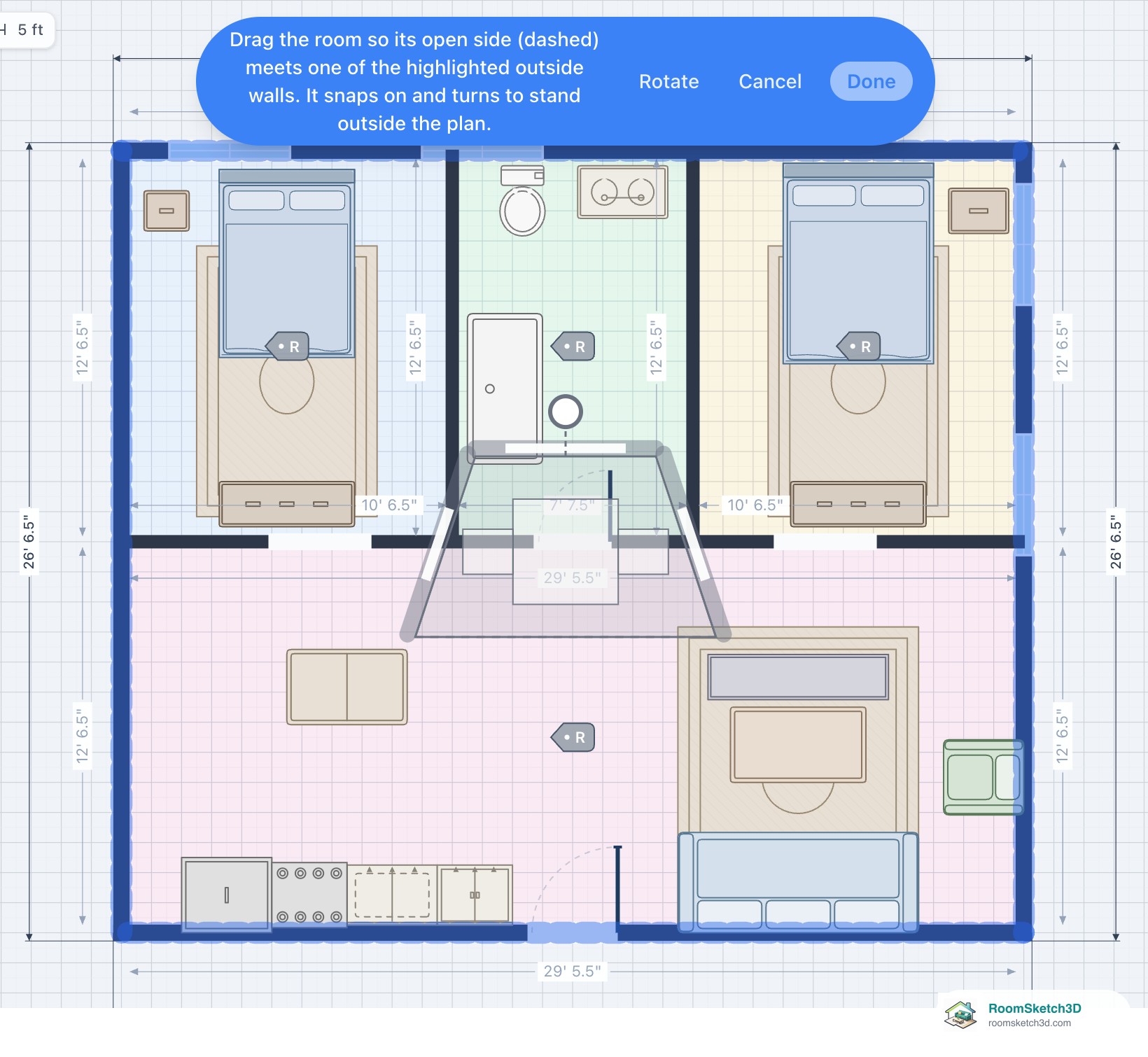 The copied dining bay floating in grey over the current plan, with its open side dashed, all outside walls highlighted in blue, and the banner Drag the room so its open side (dashed) meets one of the highlighted outside walls, with Rotate, Cancel and Done — RoomSketch3D floor plan creator