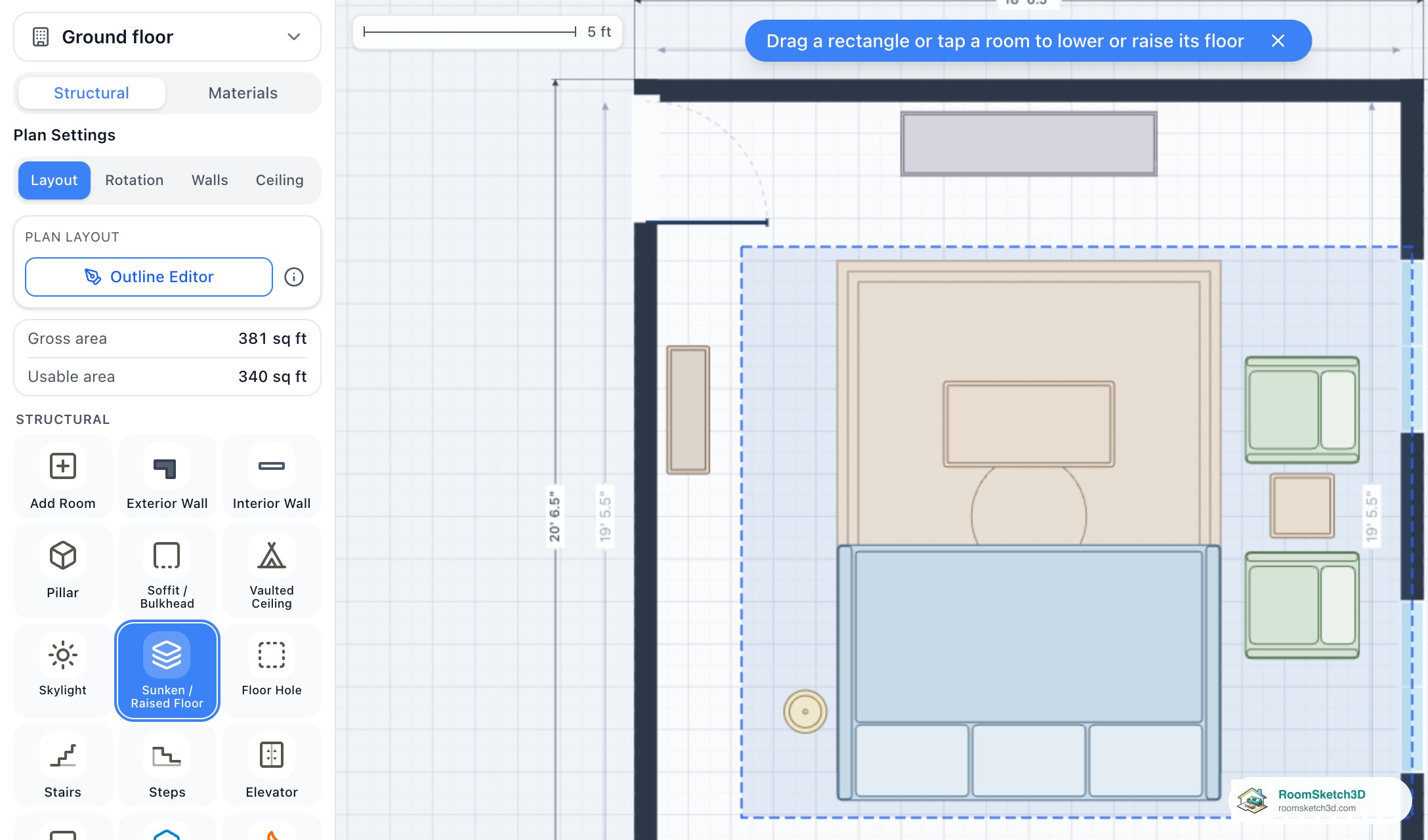 The Sunken / Raised Floor tile selected in the RoomSketch3D Build panel, the note Drag a rectangle or tap a room to lower or raise its floor, and a dashed rectangle being dragged over a living room's sofa and rug
