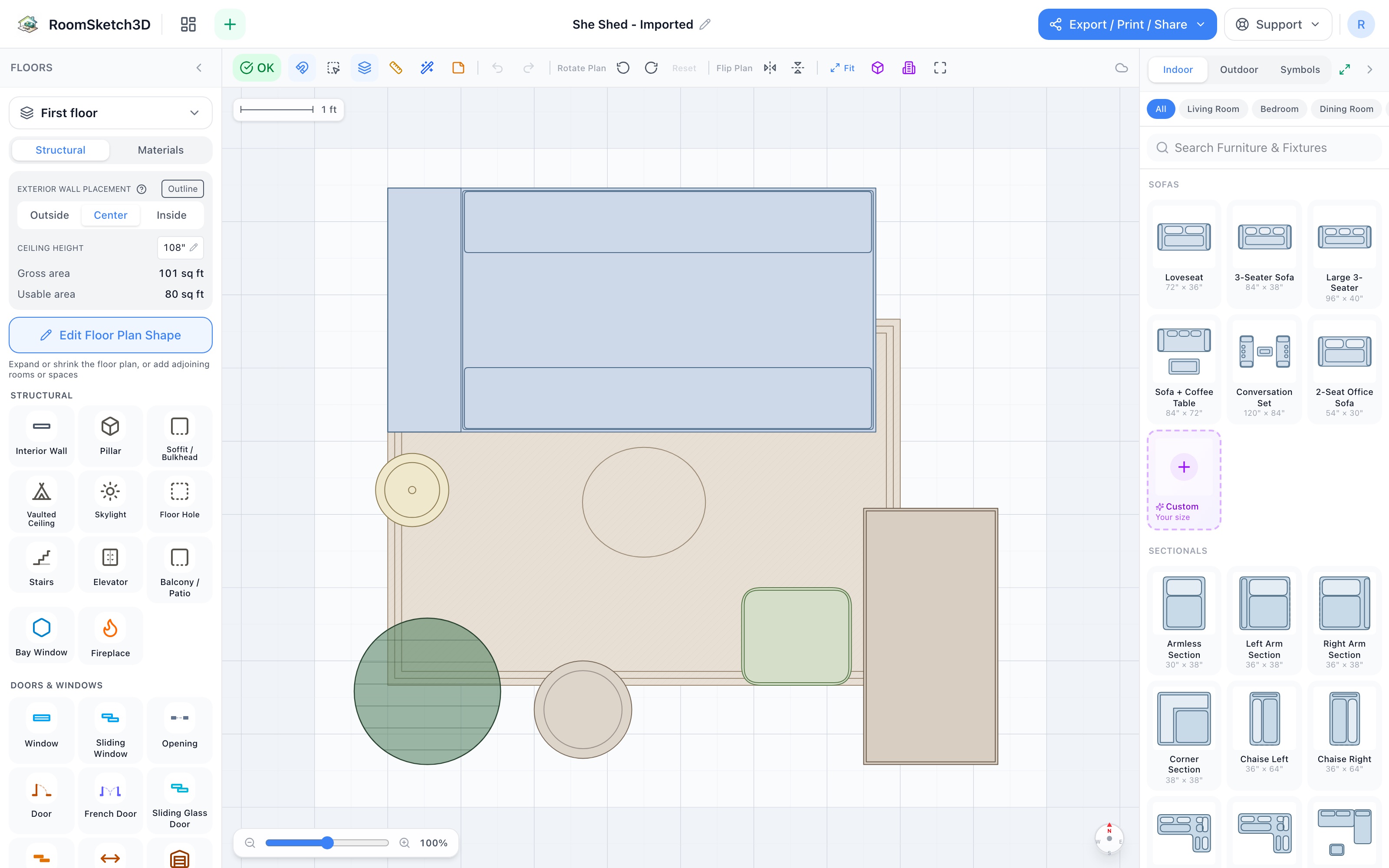 She shed floor plan in 2D: an 80-inch daybed along the top wall, a writing desk and vanity stool in the bottom-right corner facing the room, a large plant in the bottom-left corner, a floor lamp at the daybed's foot, a storage basket beside the daybed, and a 5×7 rug turned sideways under the middle — RoomSketch3D room planner app